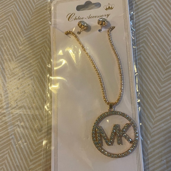 Michael Kors Jewelry - Gold MK necklace and earring set